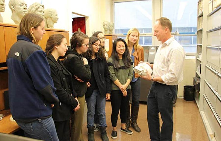 examiner giving students tour