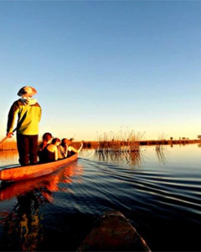 students in canoe on study abroad trip