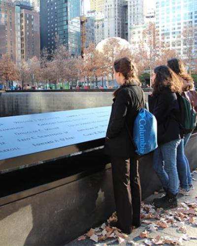 students visiting the 9/11 memorial site in NYC